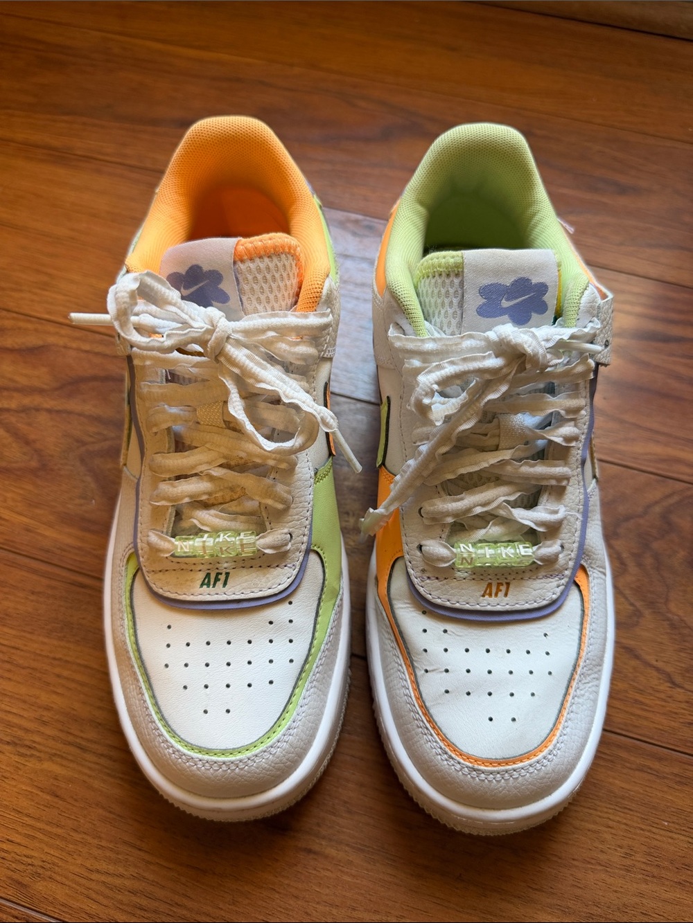 Women’s White Nike AF1 Sneakers with Orange & Lime Accents